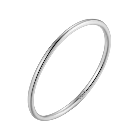 How to tell real 925 silver from fake: a hallmarked 925 sterling silver Loretana band held up to the light