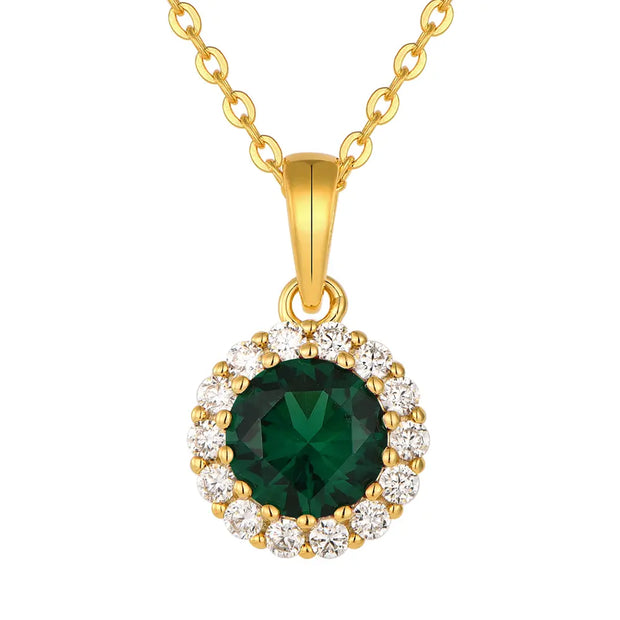 Close up of the 14K Gold Emerald Halo Necklace highlighting the precision-cut AAAAA zirconia and the high-polish 14K gold-plated setting.