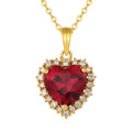 Red CZ Heart Necklace in 14K gold-plated 925 silver: a heart-cut red AAAAA cubic zirconia bordered with white stones, on white.