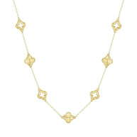 Clover Pendant Necklace in 14K gold-plated 925 silver with alternating open and sunburst clover stations, on white