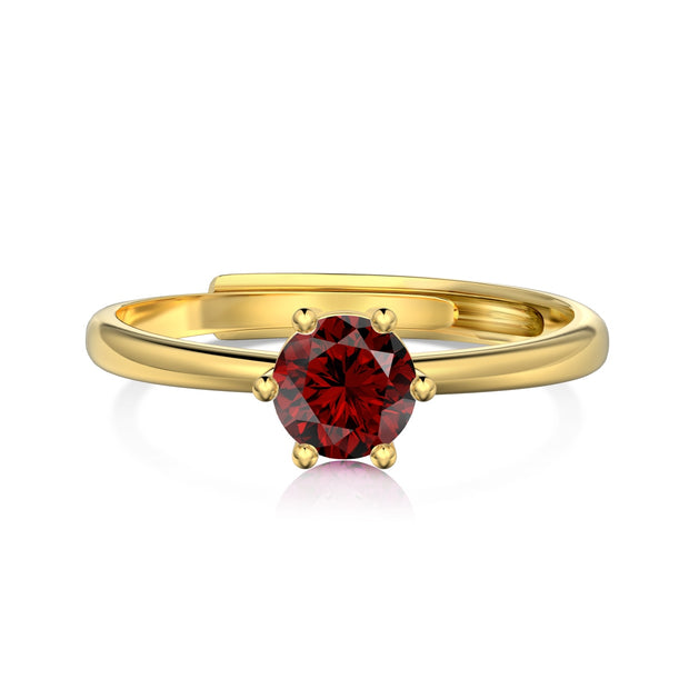 Close-up of the birthstone ring highlighting the diamond-grade AAAAA zirconia and gold-plated silver band