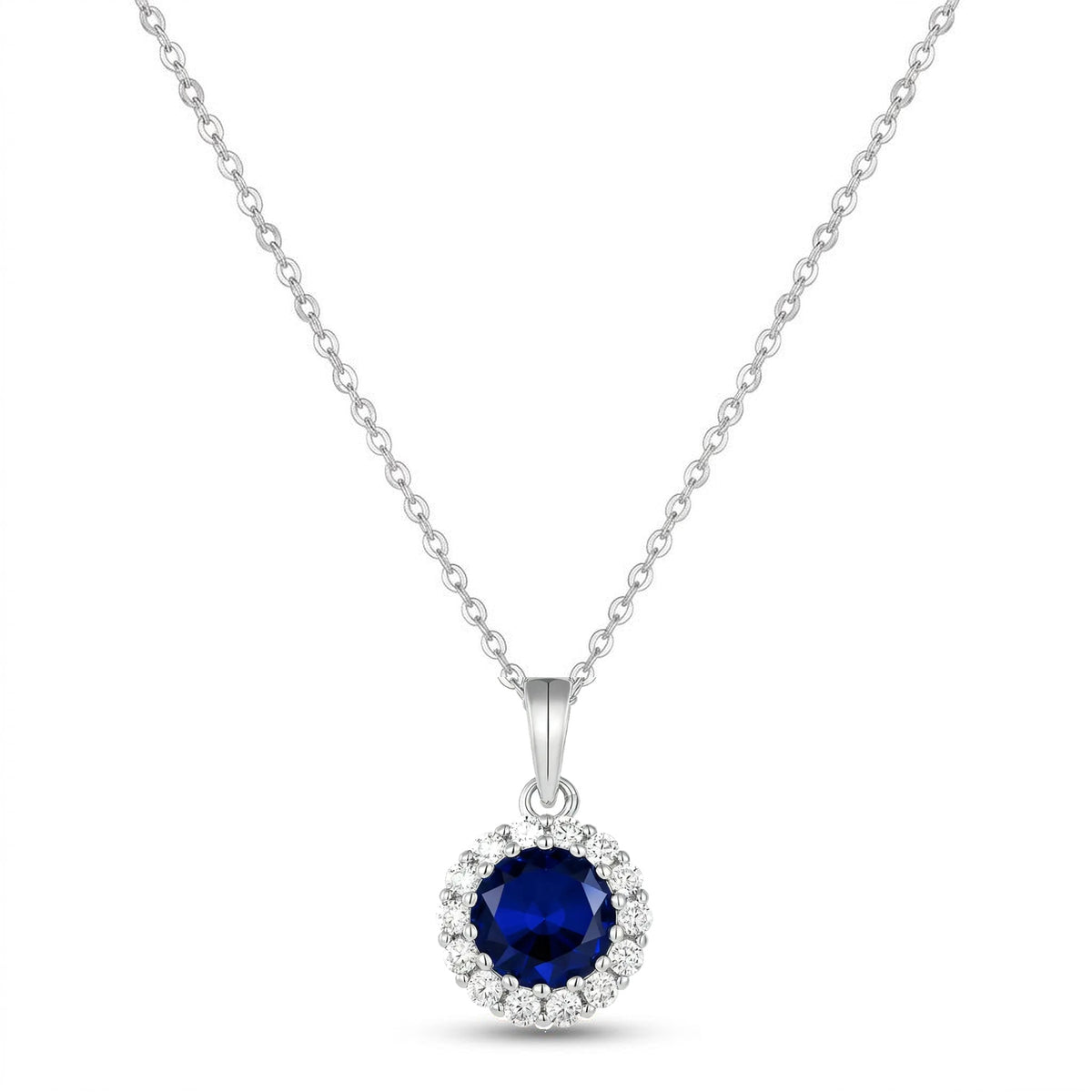 Blue CZ Halo Necklace in rhodium-plated 925 silver: a round deep blue AAAAA cubic zirconia framed by white stones, on a fine chain