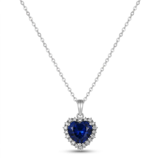 Blue CZ Heart Necklace in rhodium-plated 925 silver: a heart-cut blue AAAAA cubic zirconia framed by white stones, on a fine chain