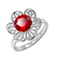 Interchangeable Stone Flower Ring in rhodium-plated 925 silver with a red AAAAA cubic zirconia stone, on white.