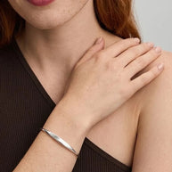Close-up of the 925 silver Personalized Letter Bangle on the wrist