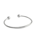 Personalized Letter Bangle in 925 sterling silver, an open cuff with ball ends and a flat engravable front, on white