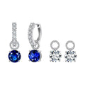 Interchangeable silver halo hoops with their two drop sets, deep blue and white AAAAA cubic zirconia, on white.