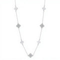 Close up of 925 silver clover necklace showing iridescent shell pearl inlay