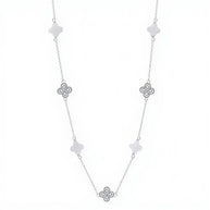 Close up of 925 silver clover necklace showing iridescent shell pearl inlay