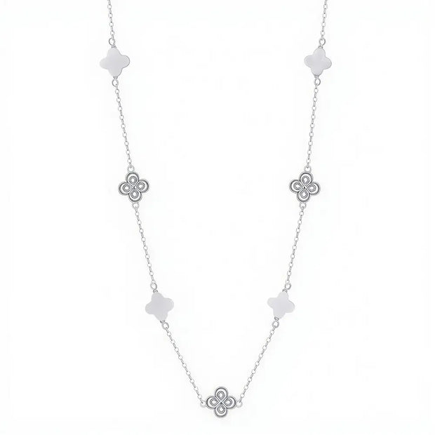 Close up of 925 silver clover necklace showing iridescent shell pearl inlay