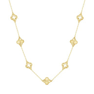 Gold necklace with clover-shaped pendants on a white background