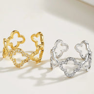 The silver Bloom four leaf clover ring presented as a sustainable luxury gift for her.