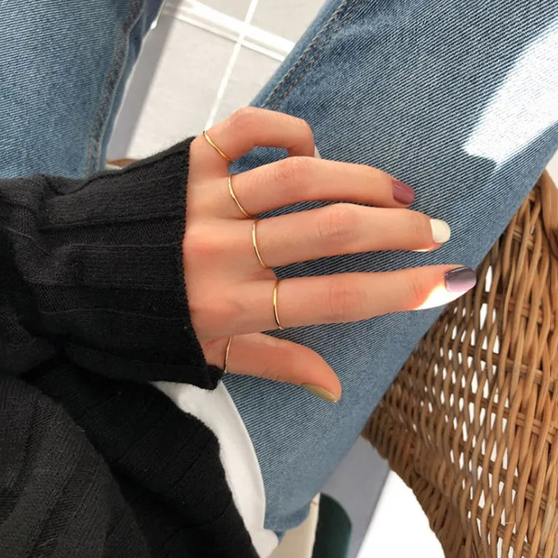 14K gold-plated 925 silver essential stacking band with an ultra-slim 1mm design on white.