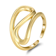 Close-up of the gold geometric ring highlighting the open-back adjustable band and sleek lines.