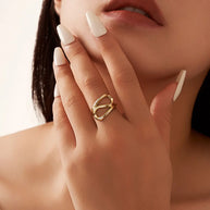 14K gold-plated 925 silver geometric adjustable ring featuring a polished minimalist design on white