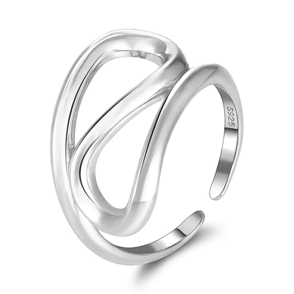 Close-up of the silver geometric ring highlighting the open-back adjustable band and sleek lines.