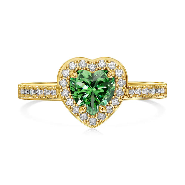 Close-up of the gold-plated heart ring highlighting the deep green AAAAA zirconia and mirror finish.