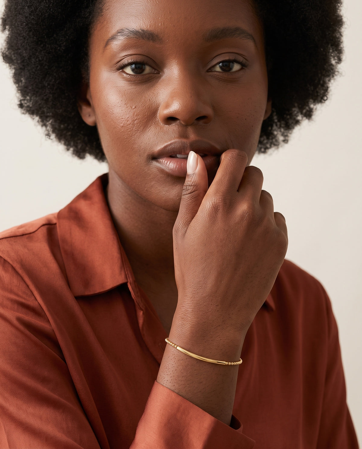 Model wearing the Bead Bar Bracelet in 14K gold-plated 925 sterling silver