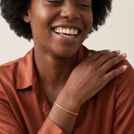 Model wearing the Bead Bar Bracelet in 14K gold-plated 925 sterling silver, second view