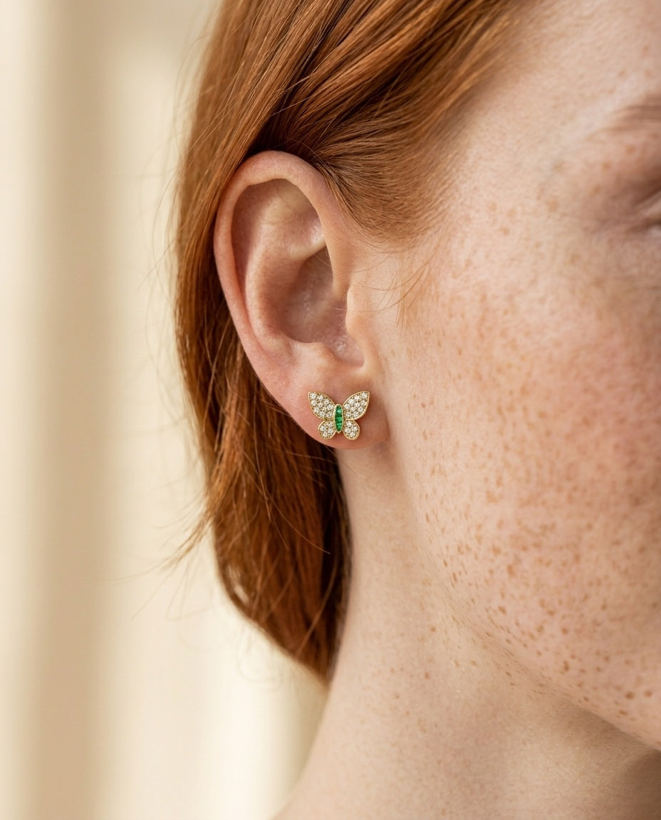 Model wearing the Butterfly Pave Studs, AAAAA CZ in 14K gold-plated 925 sterling silver, second view