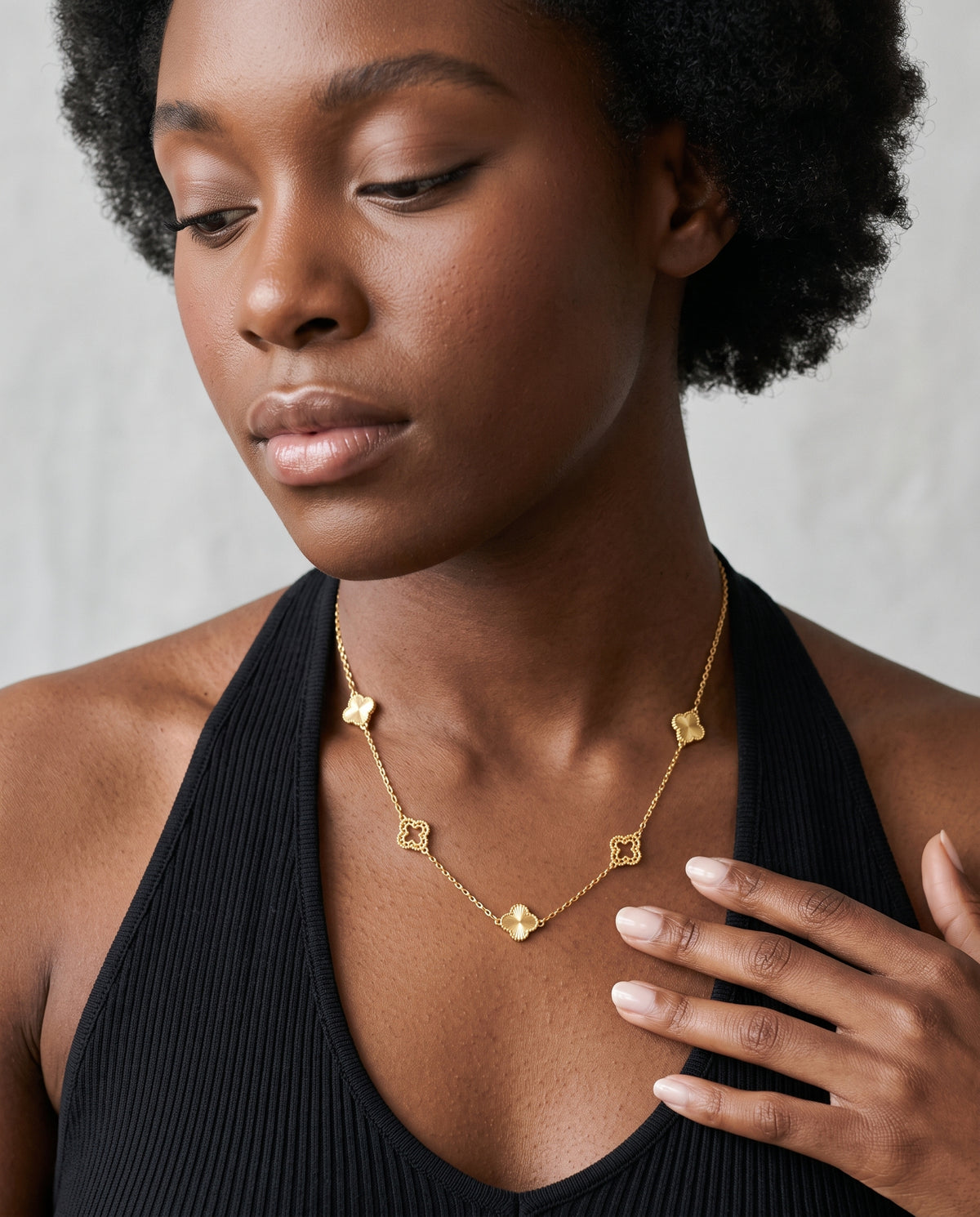 Model wearing the Clover Pendant Necklace in 14K gold-plated 925 sterling silver, second view