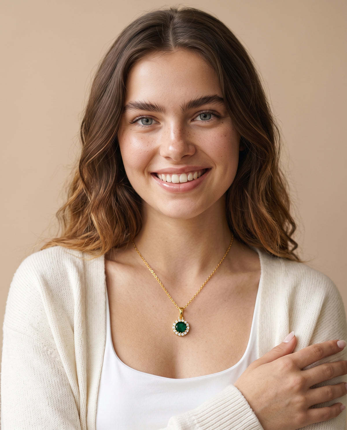 Model wearing the Green CZ Halo Necklace in 14K gold-plated 925 sterling silver