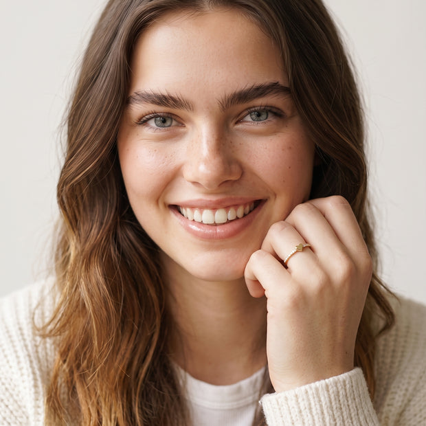 Model wearing the Pave CZ Heart Ring in 14K gold-plated 925 sterling silver