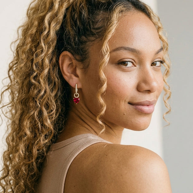 Model wearing the Interchangeable Hoops, Red CZ in gold-plated 925 sterling silver