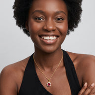 Model wearing the Red CZ Halo Necklace in 14K gold-plated 925 sterling silver