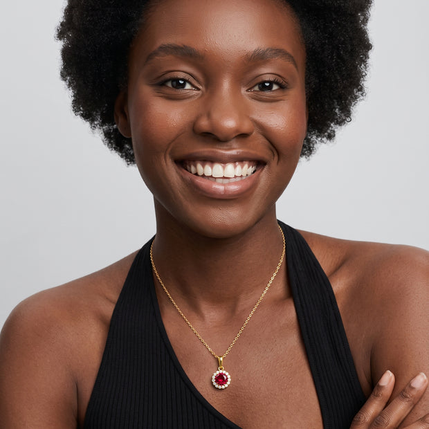Model wearing the Red CZ Halo Necklace in 14K gold-plated 925 sterling silver