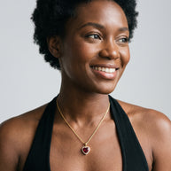 Model wearing the Red CZ Heart Necklace in 14K gold-plated 925 sterling silver