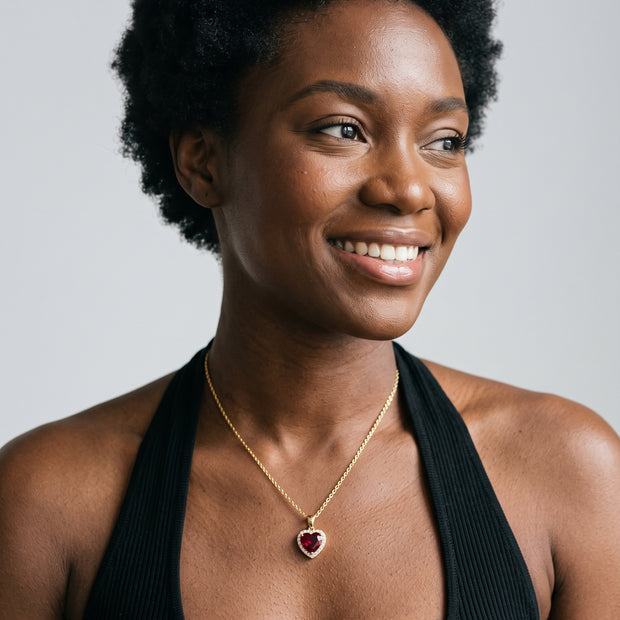 Model wearing the Red CZ Heart Necklace in 14K gold-plated 925 sterling silver