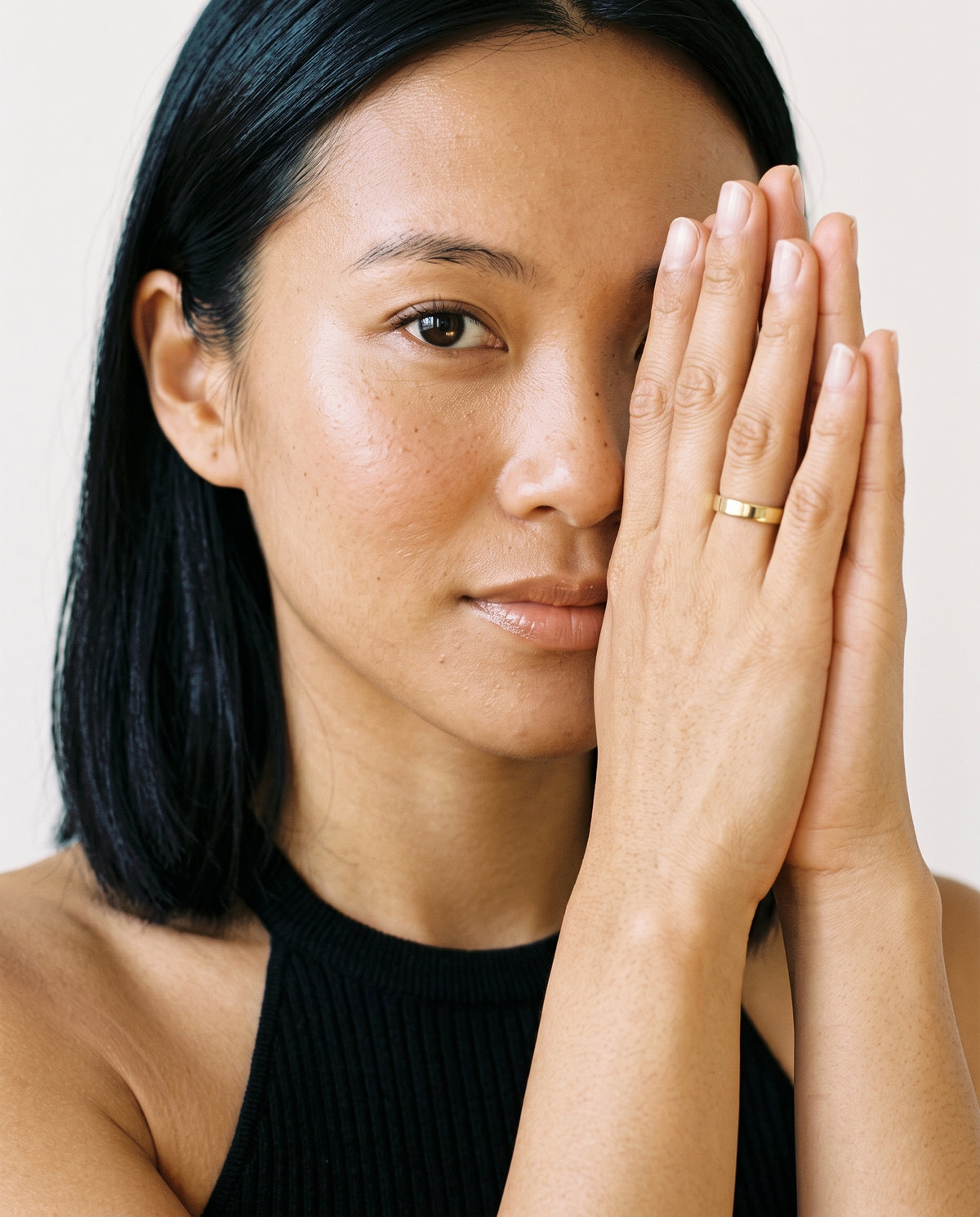 Model wearing the Engravable Stacking Ring 3mm in 14K gold-plated 925 sterling silver