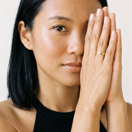 Model wearing the Engravable Stacking Ring 3mm in 14K gold-plated 925 sterling silver