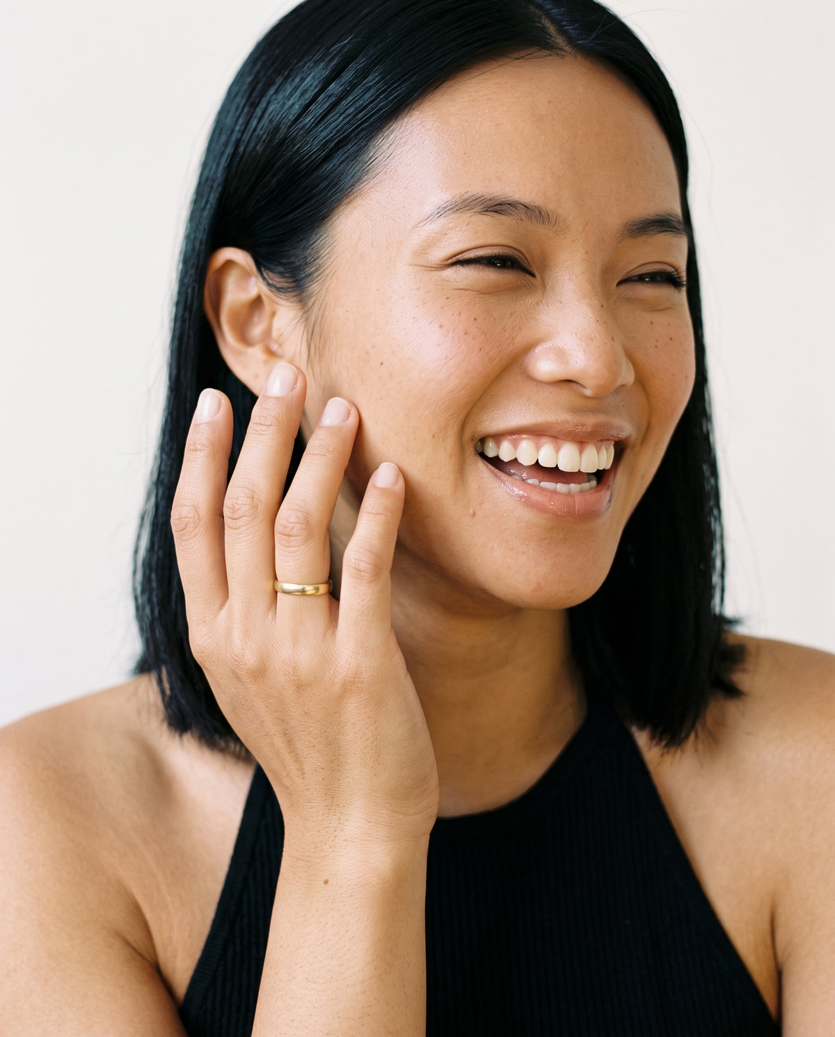 Model wearing the Engravable Stacking Ring 3mm in 14K gold-plated 925 sterling silver, second view