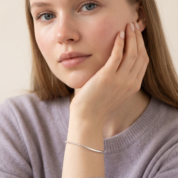 Model wearing the Bead Bar Bracelet in 925 sterling silver