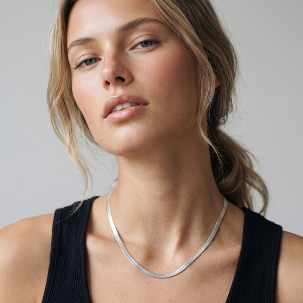 Model wearing the Flat Snake Chain Necklace 3mm in 925 sterling silver