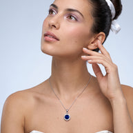 Model wearing the Blue CZ Halo Necklace in 925 sterling silver, second view