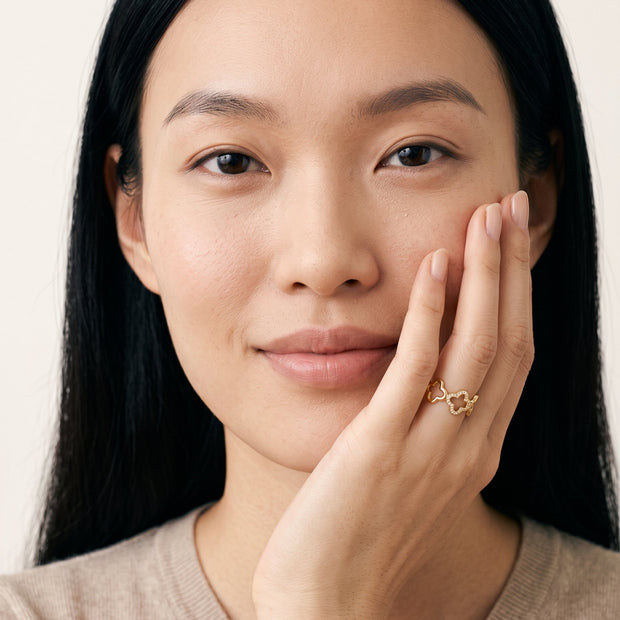 Model wearing the Clover Pave CZ Ring, Adjustable in 18K gold-plated 925 sterling silver