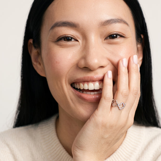 Model wearing the Clover Pave CZ Ring, Adjustable in 925 sterling silver