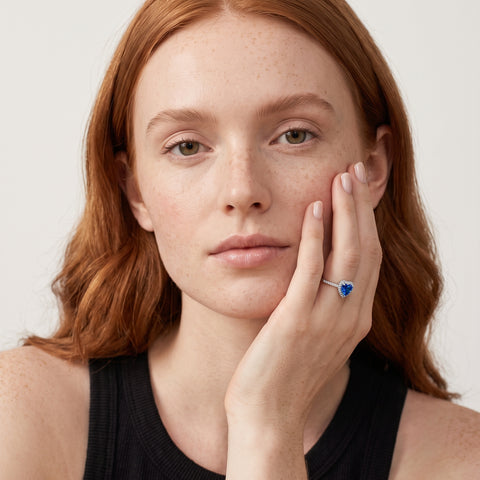Model wearing the Blue CZ Heart Ring in 925 sterling silver