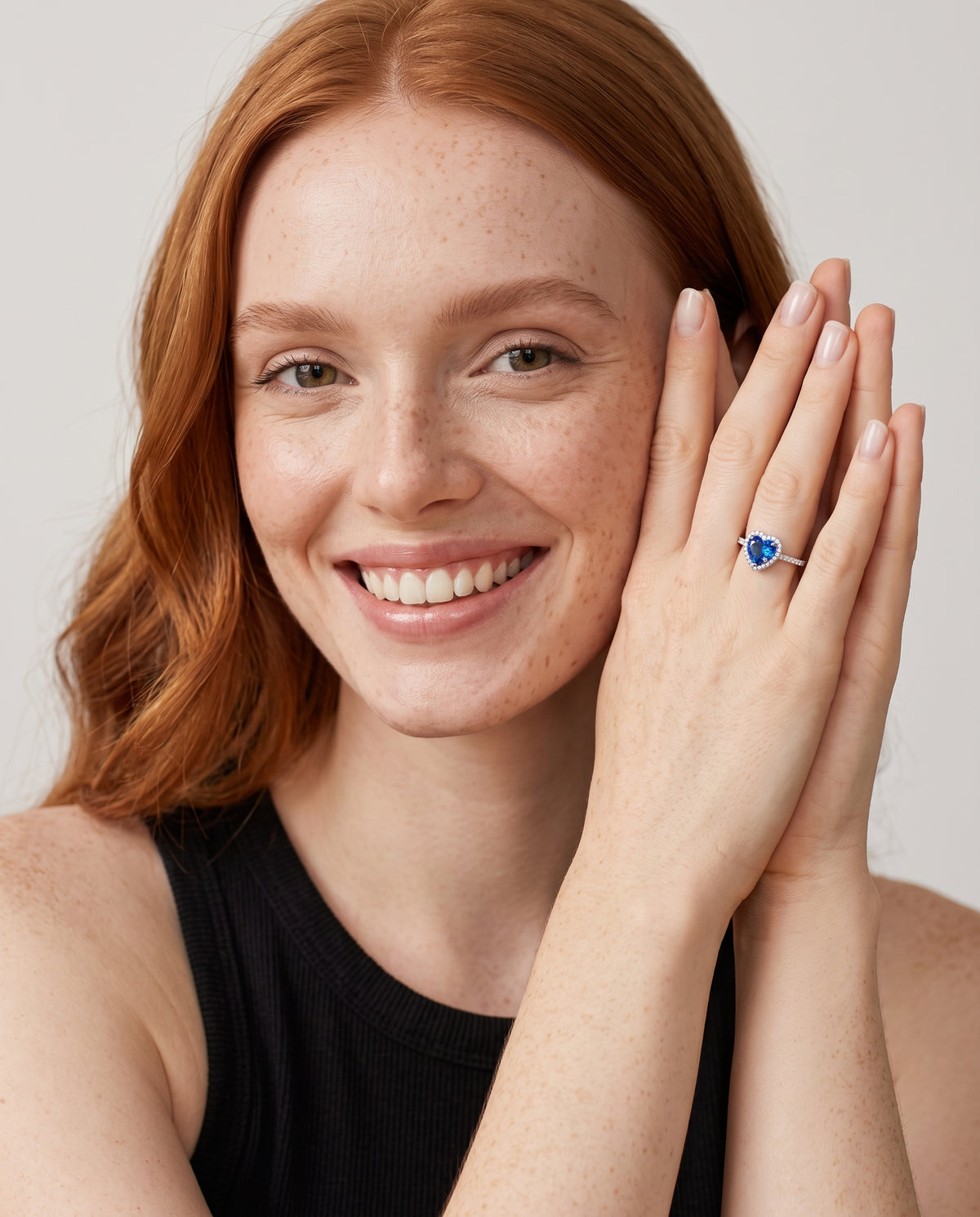 Model wearing the Blue CZ Heart Ring in 925 sterling silver, second view