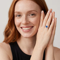 Model wearing the Blue CZ Heart Ring in 925 sterling silver, second view