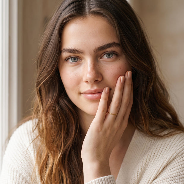 Model wearing the Essential Stacking Band Ring in 14K gold-plated 925 sterling silver