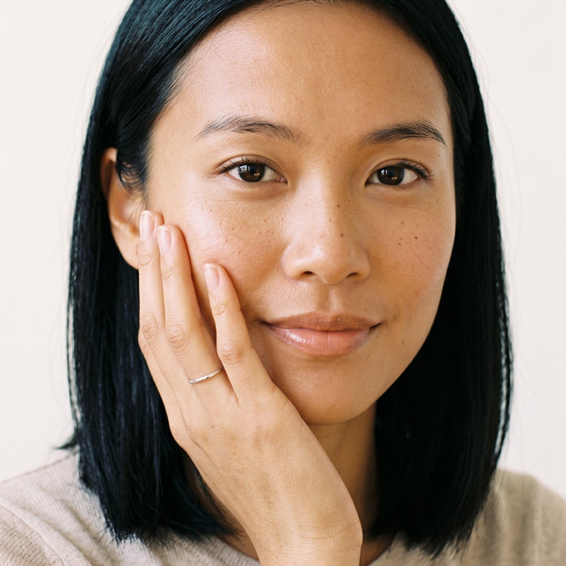 Model wearing the Essential Stacking Band Ring in 925 sterling silver