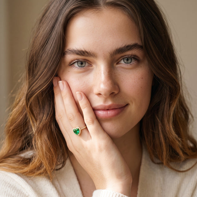 Model wearing the Green CZ Heart Ring in 14K gold-plated 925 sterling silver