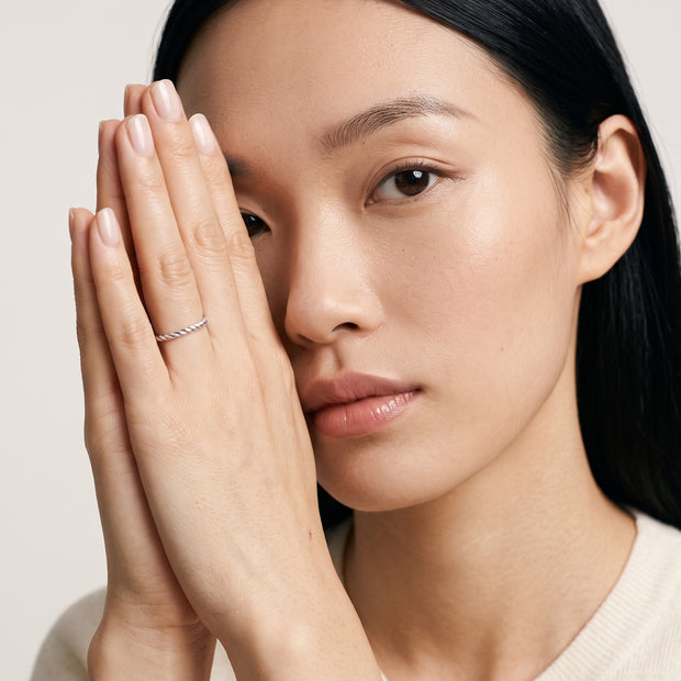 Model wearing the Twisted Rope Band Ring in 925 sterling silver