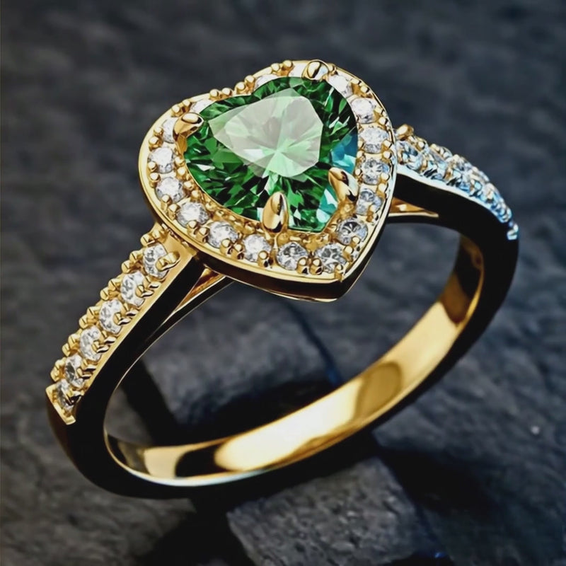 green-heart-gold-plated-ring-925-silver-main
14K gold-plated 925 silver heart ring featuring a brilliant green AAAAA zirconia on white background.