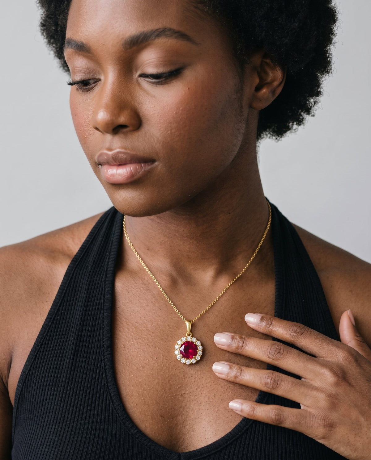 Model wearing the Red CZ Halo Necklace in 14K gold-plated 925 sterling silver, second view