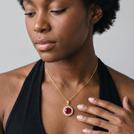 Model wearing the Red CZ Halo Necklace in 14K gold-plated 925 sterling silver, second view
